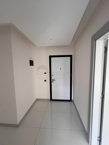 3+1 Wohnung in einem neuen Komplex mit einem großen Grundstück