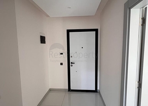 3+1 Wohnung in einem neuen Komplex mit einem großen Grundstück