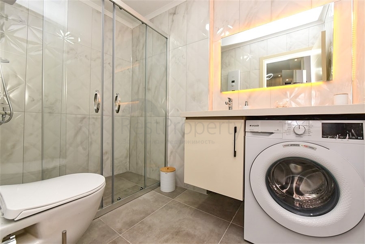 Zweizimmerwohnung mit Zugang zum Garten im Zentrum von Alanya