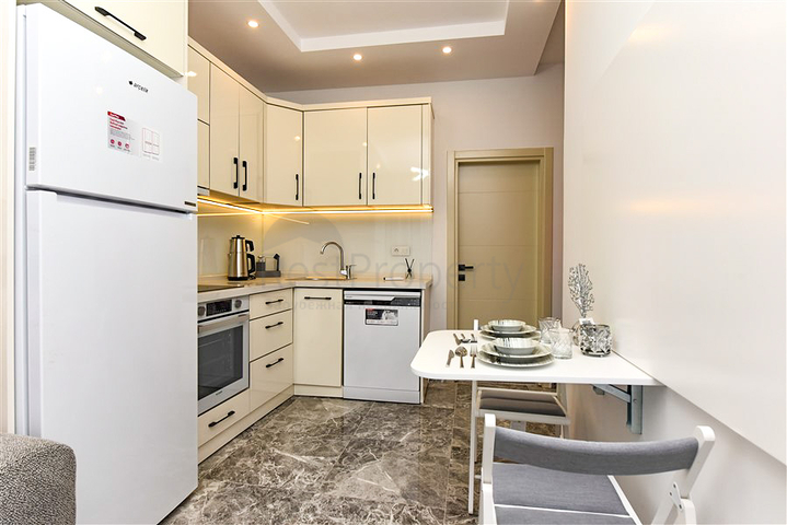 Zweizimmerwohnung mit Zugang zum Garten im Zentrum von Alanya