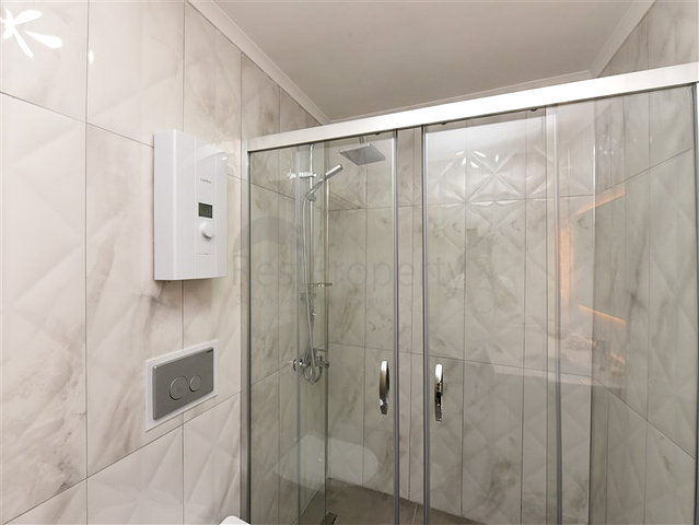 Zweizimmerwohnung mit Zugang zum Garten im Zentrum von Alanya