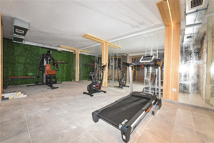 Zweizimmerwohnung mit Zugang zum Garten im Zentrum von Alanya