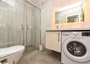 Zweizimmerwohnung mit Zugang zum Garten im Zentrum von Alanya