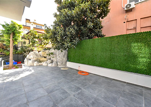 Zweizimmerwohnung mit Zugang zum Garten im Zentrum von Alanya