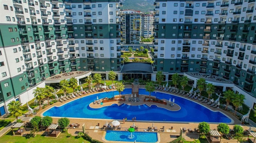 1+1 Wohnung in einer beliebten Wohnanlage im Stadtteil Mahmutlar