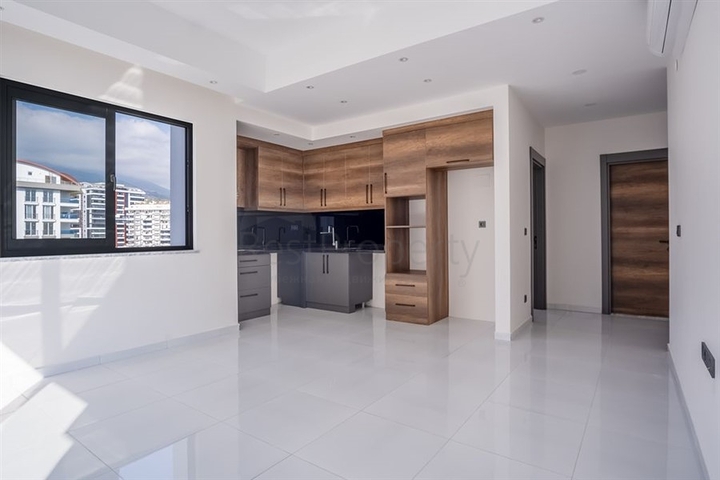 1+1 Wohnung in einer beliebten Wohnanlage im Stadtteil Mahmutlar