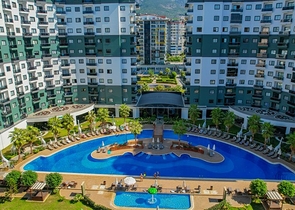 1+1 Wohnung in einer beliebten Wohnanlage im Stadtteil Mahmutlar