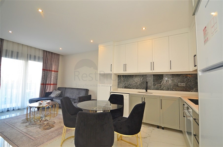 Zweizimmerwohnung in einer malerischen Gegend von Alanya und zu Fuß zum Meer