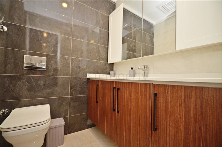 Zweizimmerwohnung in einer malerischen Gegend von Alanya und zu Fuß zum Meer