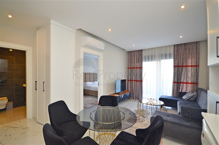 Zweizimmerwohnung in einer malerischen Gegend von Alanya und zu Fuß zum Meer