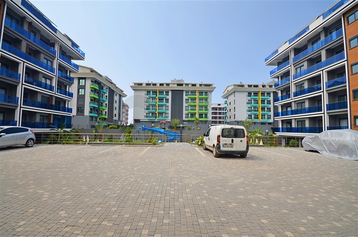 Zweizimmerwohnung in einer malerischen Gegend von Alanya und zu Fuß zum Meer