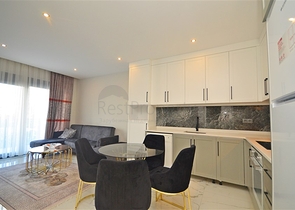 Zweizimmerwohnung in einer malerischen Gegend von Alanya und zu Fuß zum Meer