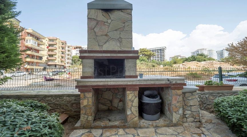 Geräumige 1+1 Wohnung in einer der besten Residenzen in der Gegend von Tosmur