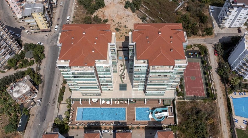 Geräumige 1+1 Wohnung in einer der besten Residenzen in der Gegend von Tosmur