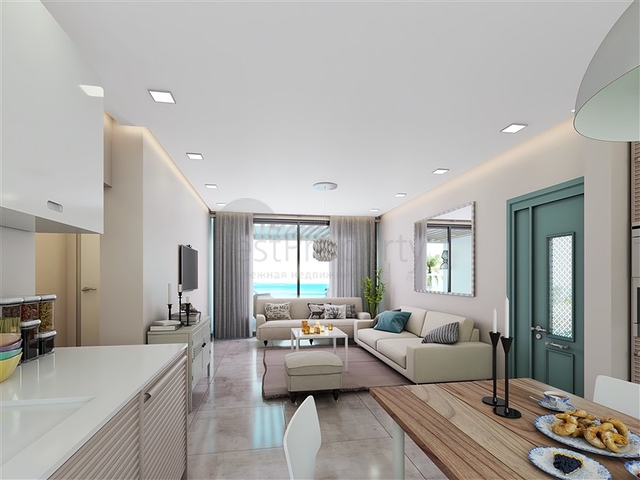 Das 2+1 Apartment verfügt über eine eigene Terrasse, 100 m vom Meer entfernt