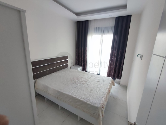 1+1 Wohnung mit Möbeln und Geräten im Stadtteil Mahmutlar