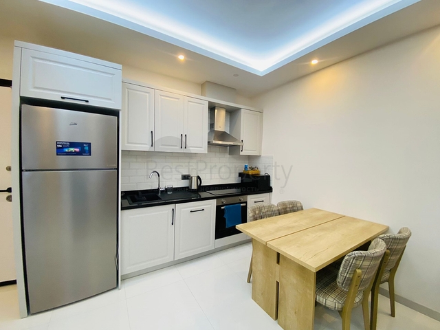 Einzigartige 1+1 Wohnung mit Zugang zum Garten