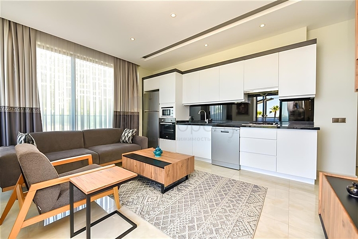 Apartment mit 2+1 Grundriss an der ersten Küste in Mahmutlar