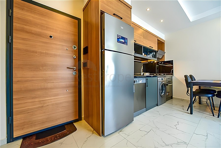 1+1 Wohnung in einem neuen Komplex im Stadtteil Mahmutlar