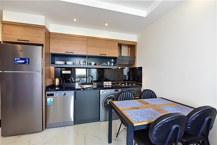 1+1 Wohnung in einem neuen Komplex im Stadtteil Mahmutlar