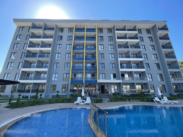 Möblierte Dreizimmerwohnung in einem neuen Haus im Stadtteil Gazipasa