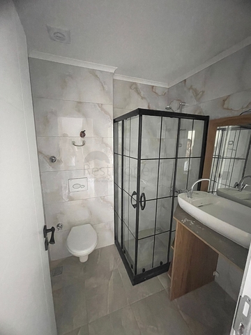 Möblierte Dreizimmerwohnung in einem neuen Haus im Stadtteil Gazipasa