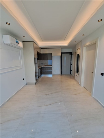 1+1 Wohnung an der ersten Küste in Mahmutlar