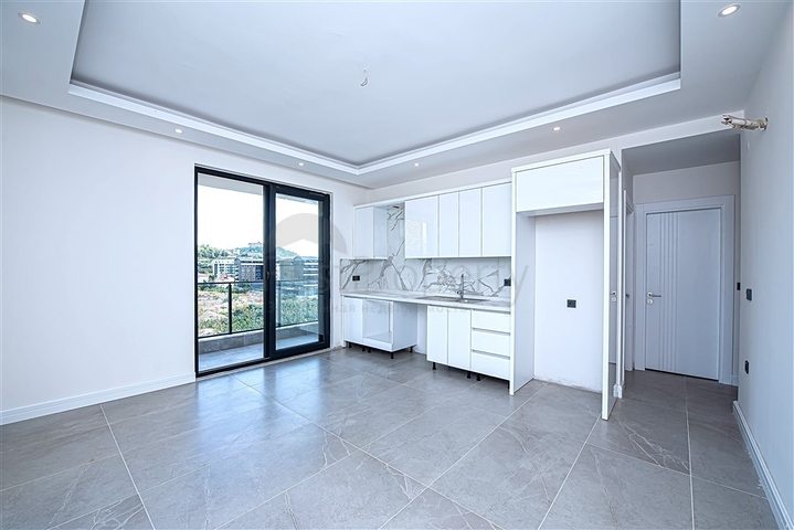 Penthouse 3+1 im Stadtteil Kargicak, 350 m vom Meer entfernt 