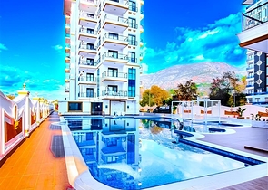 Neue 1+1 Wohnung im Stadtteil Mahmutlar