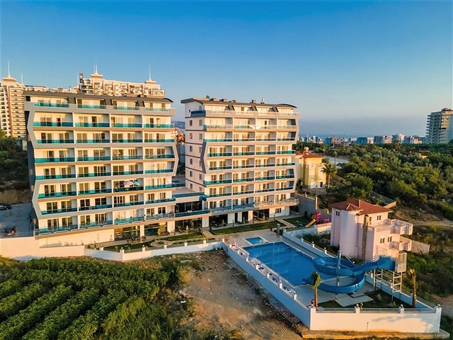 1+1 Wohnung in einem modernen Komplex im Stadtteil Mahmutlar