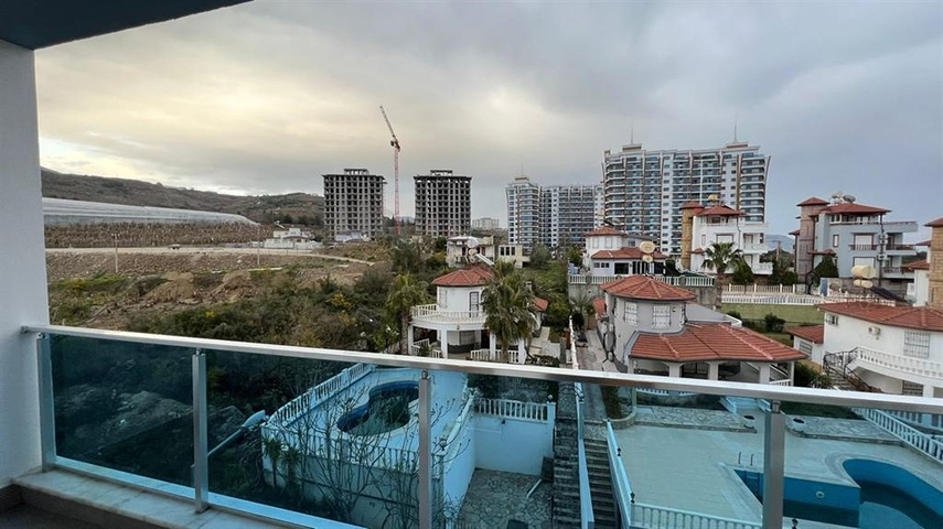 1+1 Wohnung in einem modernen Komplex im Stadtteil Mahmutlar