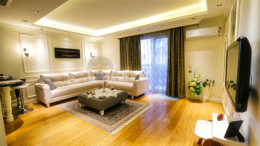 Wohnung 2+1 in einem Hotelplankomplex, 5 Minuten vom Meer entfernt