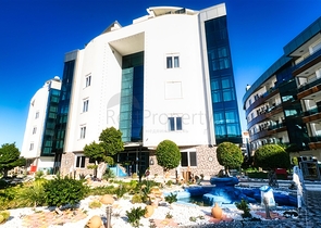 Wohnung 2+1 in einem Hotelplankomplex, 5 Minuten vom Meer entfernt