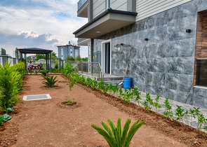 Gebäude mit 4 Wohnungen in der Gegend von Doshemealty - Antalya 