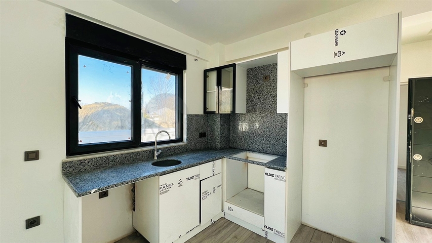 Apartment mit 1+1 Grundriss im Stadtteil Kemer - Antalya 