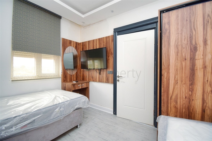 Villa mit 7+3 Grundrissen in Altyntas - Antalya 