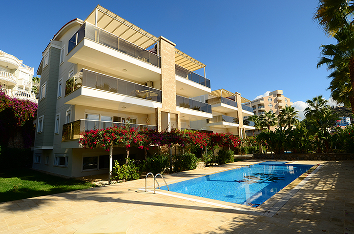 Maisonette mit Zugang zum Garten in einem Luxus-Komplex