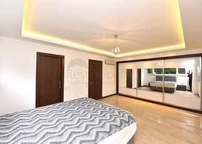 Maisonette mit Zugang zum Garten in einem Luxus-Komplex