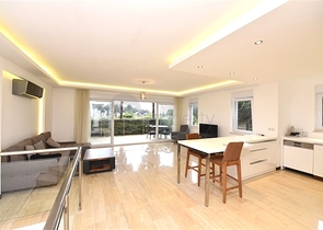 Maisonette mit Zugang zum Garten in einem Luxus-Komplex