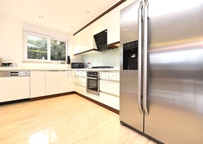 Maisonette mit Zugang zum Garten in einem Luxus-Komplex