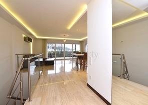 Maisonette mit Zugang zum Garten in einem Luxus-Komplex