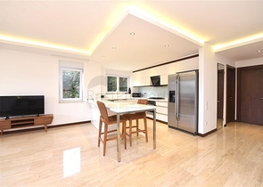 Maisonette mit Zugang zum Garten in einem Luxus-Komplex