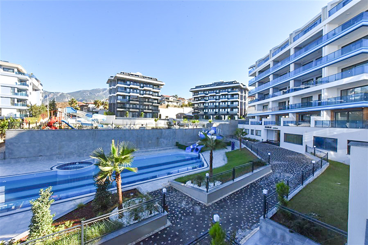 Hochmoderne 3+1-Maisonette mit eigenem Garten in einem Luxus-Komplex