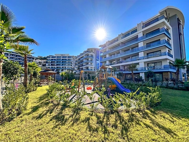 Hochmoderne 3+1-Maisonette mit eigenem Garten in einem Luxus-Komplex