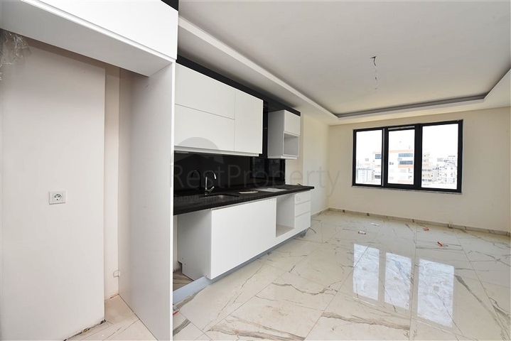 Zweizimmerwohnung mit Panoramablick auf die Berge im Stadtteil Mahmutlar