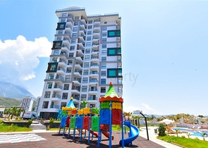 1+1 Wohnung in einem neuen Komplex im Stadtteil Mahmutlar