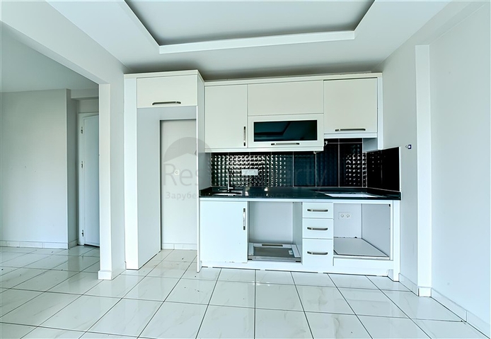 Geräumige 1+1 Wohnung 400 m vom Meer entfernt im Stadtteil Mahmutlar