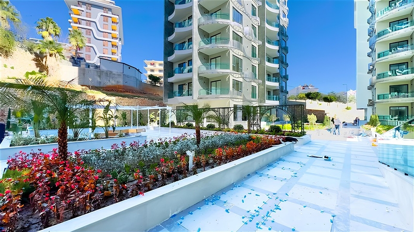 1+1 Wohnung in der Gegend von Tosmur von einem der besten Entwickler von Alanya