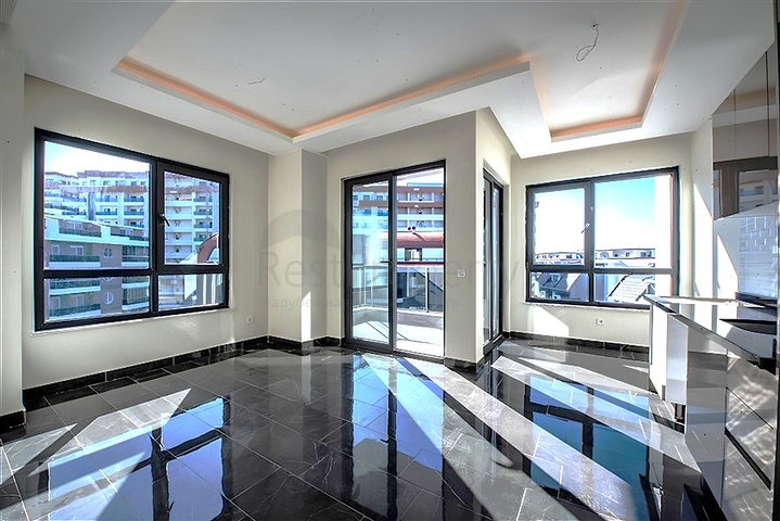 1+1 Wohnung in einer neuen Wohnanlage im Bezirk Mahmutlar zu einem günstigen Preis 