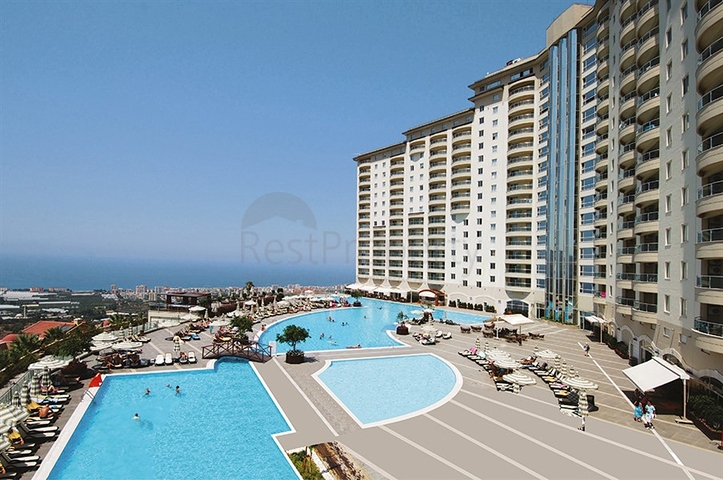 2+1 Meerblick-Wohnung in einer Anlage mit Hotelinfrastruktur im Bezirk Kargicak/Alanya